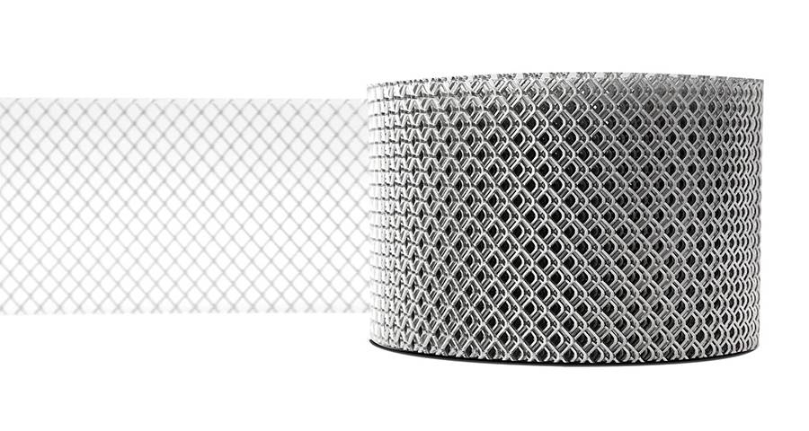 A roll of half-unrolled expanded metal gutter cover mesh
