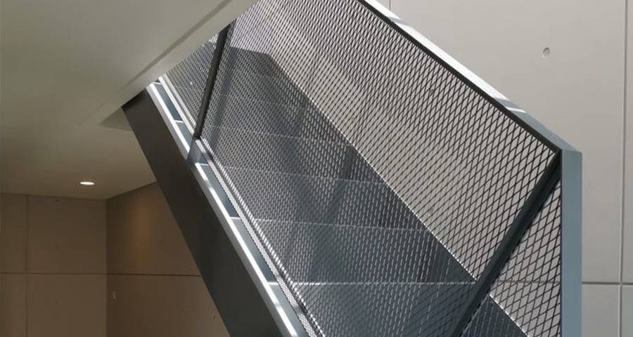 Expanded metal infill panels for indoor Stair railings