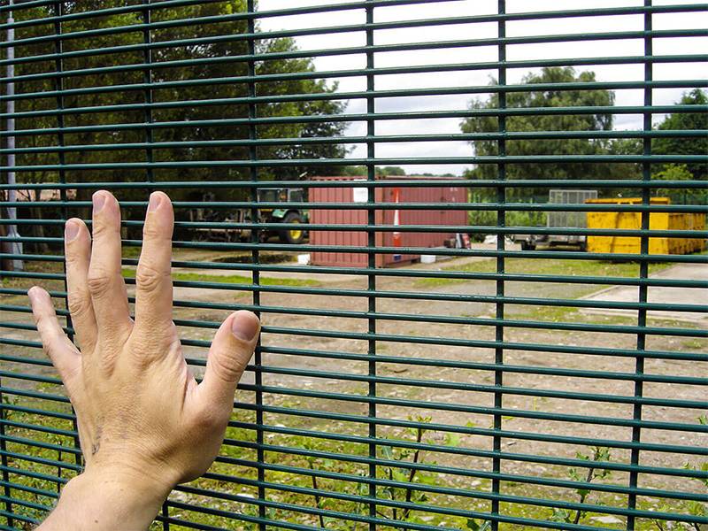 Compare the mesh size of 358 high safety fencing by hand