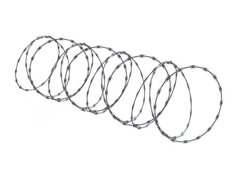 A roll of unfolded razor wire