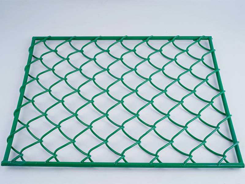 Green chain link helipad perimeter safety netting with frame