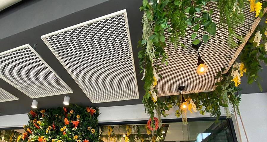 Expanded mesh ceiling installed on top of dining room