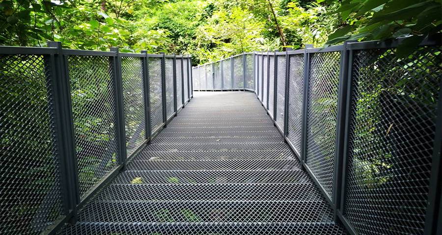Expanded metal mesh walkway with expanded mesh filled railings in scenic spot