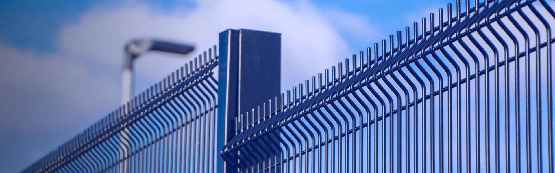 3D security fence under blue sky and white clouds
