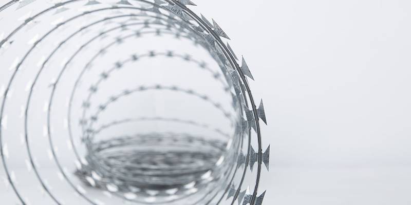 A roll of unrolled hot-dip galvanized razor wire