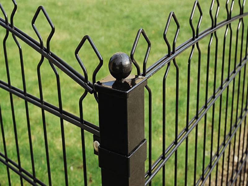 Black PVC prestige wire mesh fence on green grass